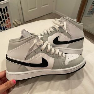 White and grey Jordan 1s